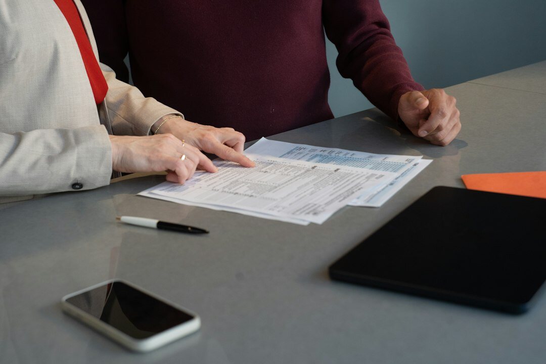 person with insurance papers