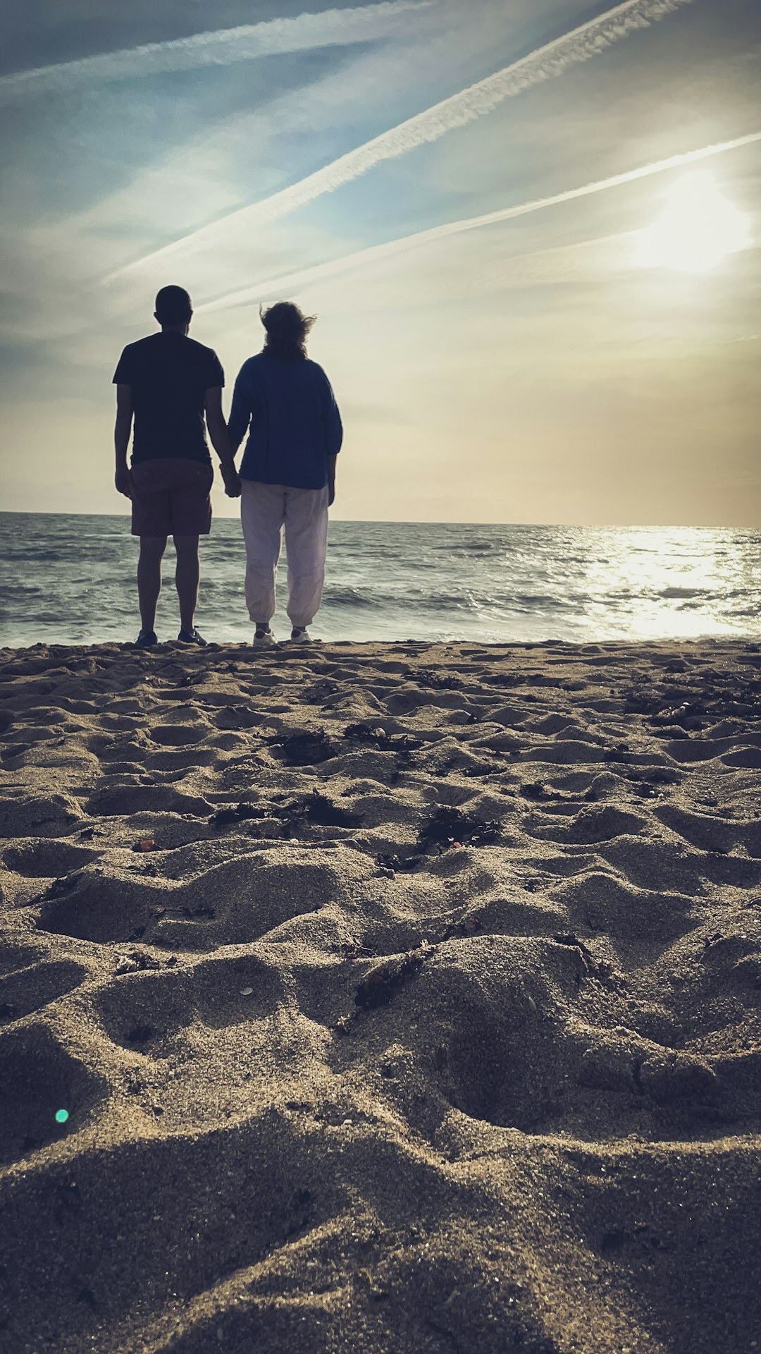 retired couple on beach